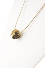 round-camel-bone-pendant-with-leather-cord-necklace-3
