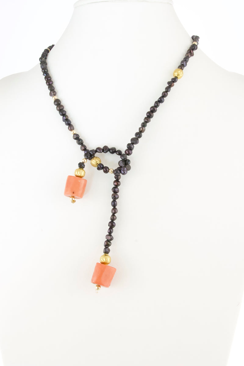 black-freshwater-pearl-coral-bead-laureate